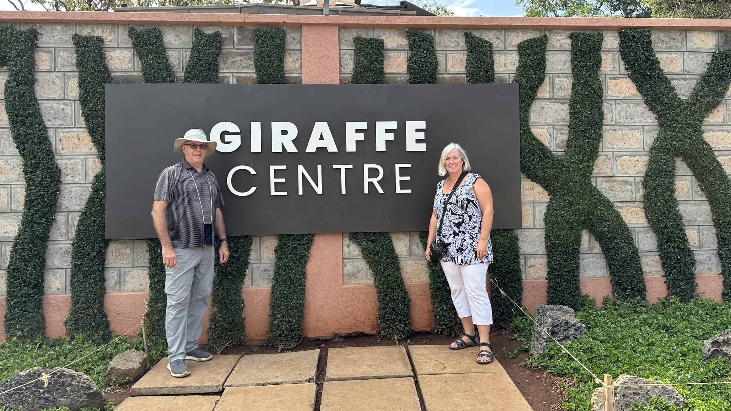 Our photo in front of the Giraffe Centre