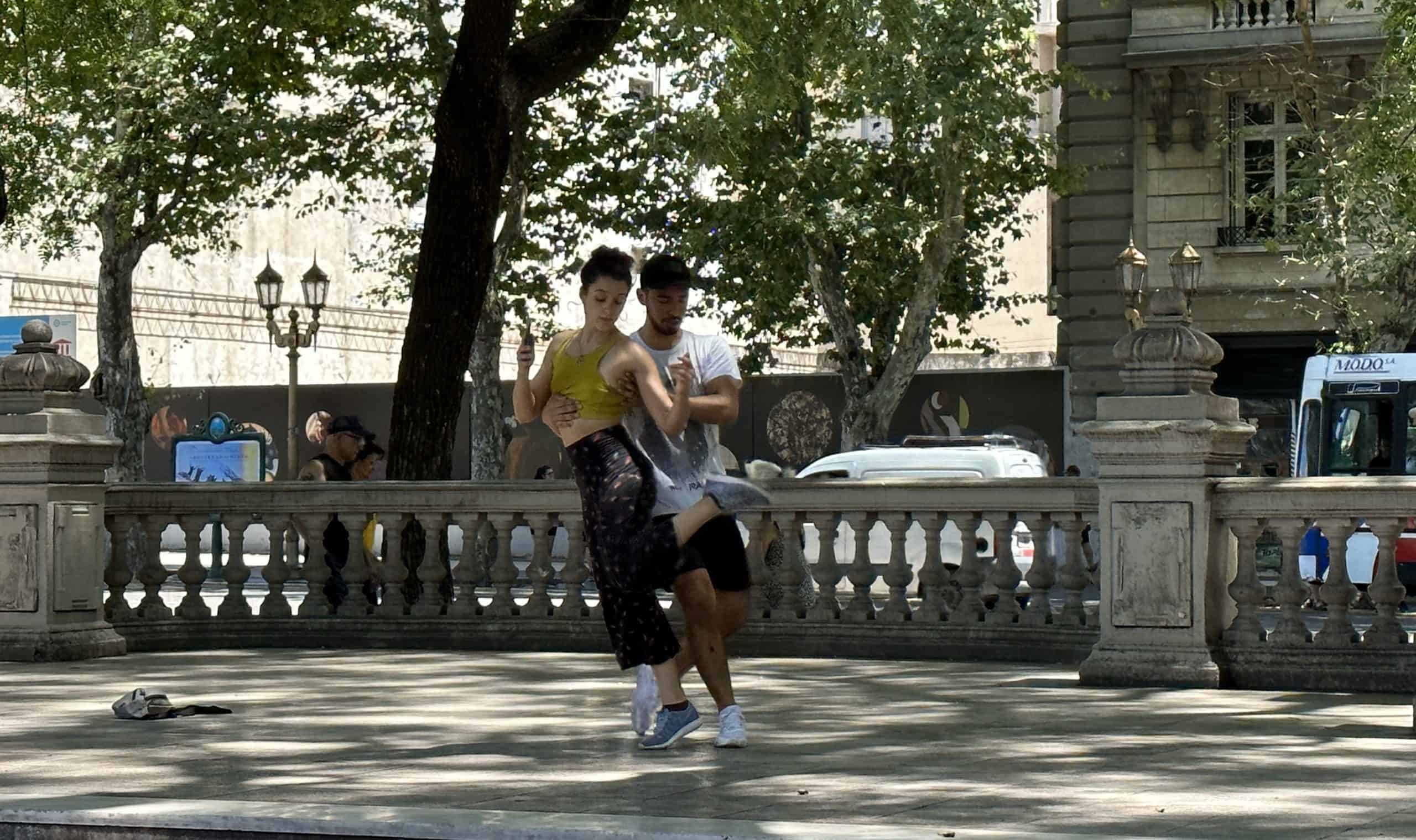 Couple dancing the tango in the park
